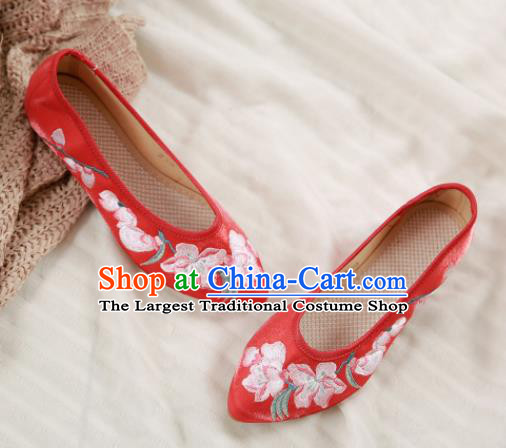 red embroidered shoes
