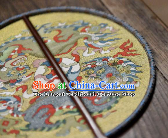 China Handmade Double Lions Pattern Palace Fan Traditional Yellow Silk Fan Ancient Ming Dynasty Court Circular Fan