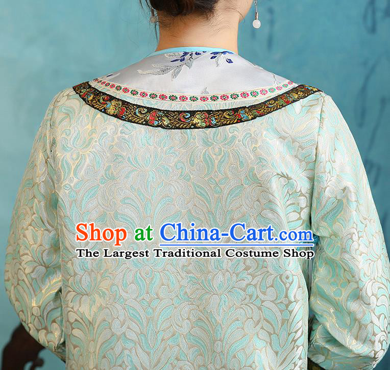 China Ancient Qing Dynasty Court Maid Green Dress Garments Traditional Manchu Woman Clothing and Hair Accessories