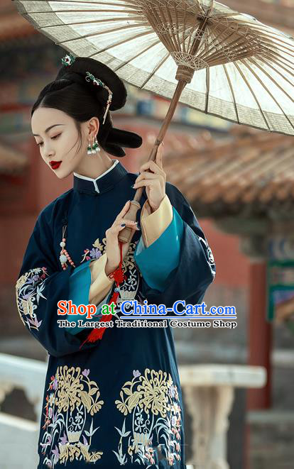 China Qing Dynasty Imperial Consort Historical Clothing Ancient Manchu Woman Navy Dress Traditional Court Garments and Headpieces