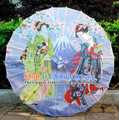 Colourful womens costumes under umbrellas ;a woman girl girls